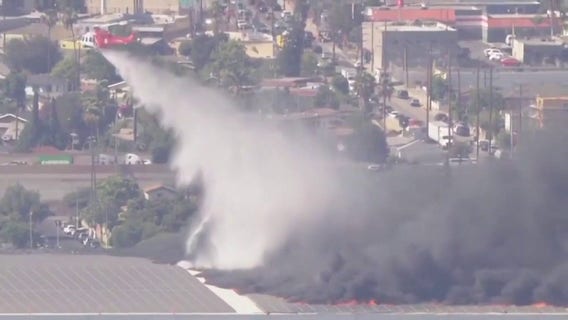 Boyle Heights warehouse fire prompts rare helicopter water drops, extended air quality warning