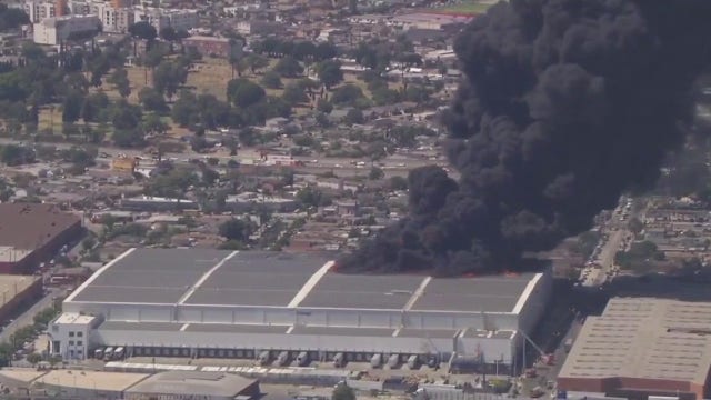 LIVE: Massive fire at a warehouse in Boyle Heights