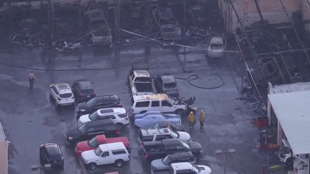 Cars damaged after early morning fire at Valencia dealership
