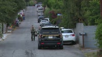 Hours-long standoff continues in Chatsworth with armed domestic violence suspect
