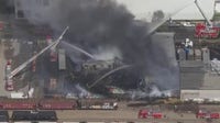 Massive fire breaks out at warehouse in Vernon