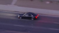 Search underway for Los Angeles police chase suspects; At least 2 detained