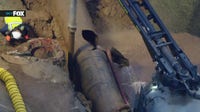Repairs underway after century-old water main burst floods West Hollywood, opening sinkhole