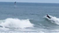 CAUGHT ON CAMERA: Great white shark jumps out of water behind Newport Beach surfer
