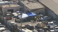 3 charged with premeditated murder after body found in burned car at South LA tow yard