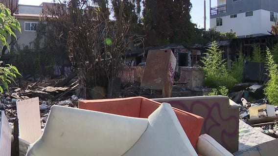 Family says squatters still plague property four months after devastating fire