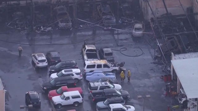Cars damaged after early morning fire at Valencia dealership