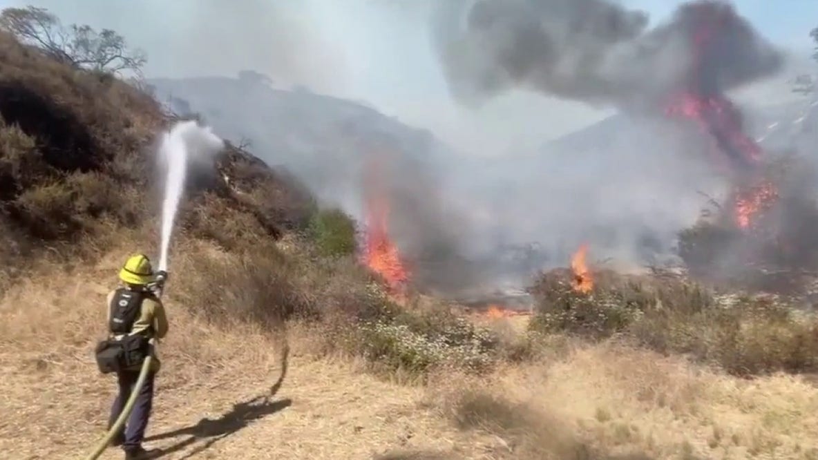Burning car sparks 40-acre brush fire in Burbank, forcing evacuations