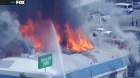 Fire tears through roof of vacant building in Huntington Park