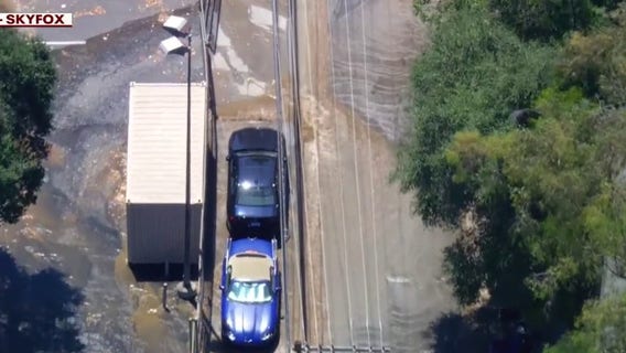 Water main break causes street flooding in Hollywood Hills