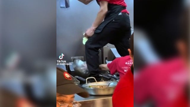 Viral video shows Panda Express employee standing on fryer while cleaning