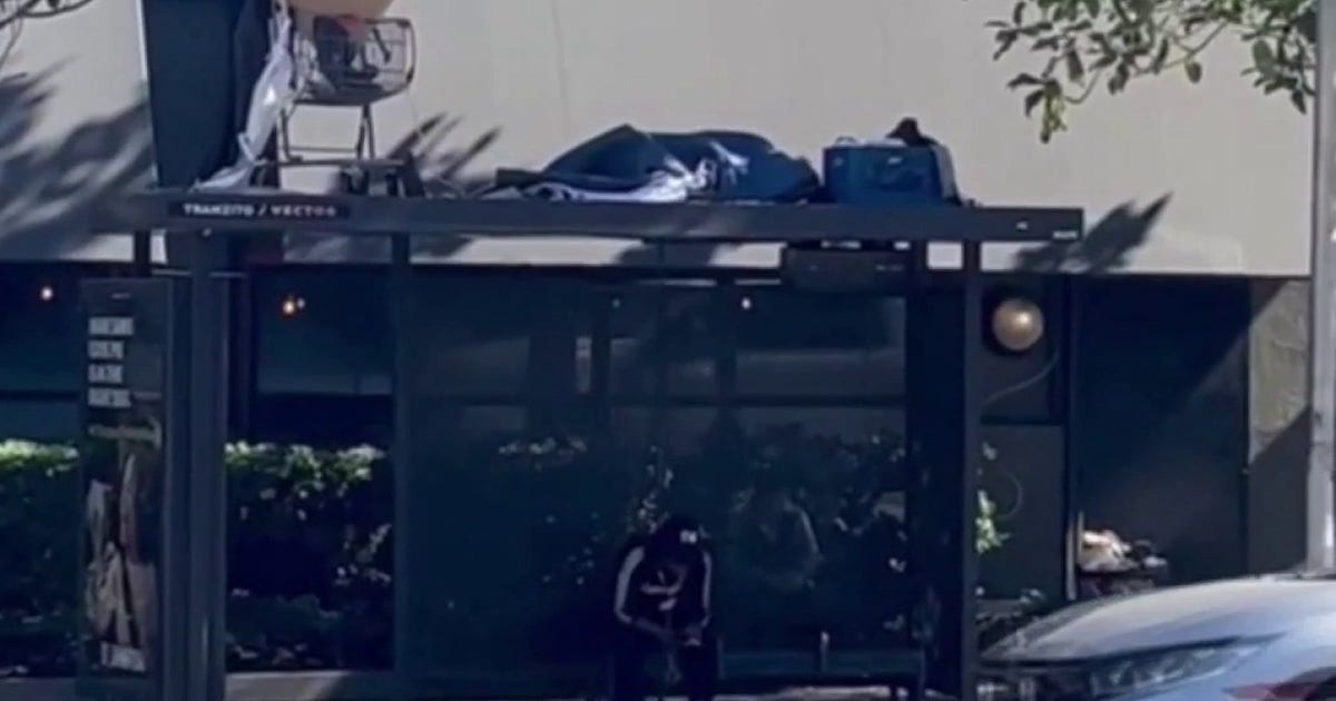 Homeless encampment spotted on top of Los Angeles bus stop