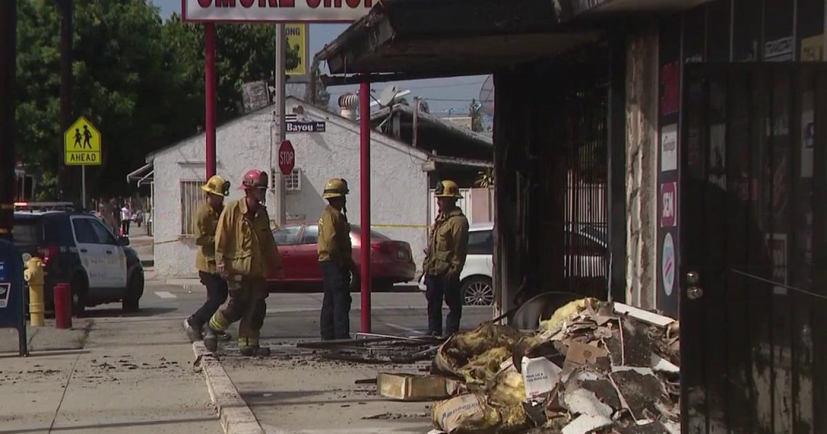 Bellflower smoke shop catches fire after shooting; Suspects on the run