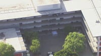 Student dies after falling from building at Highland Park school