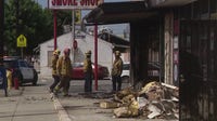 Bellflower smoke shop catches fire after shooting; Suspects on the run