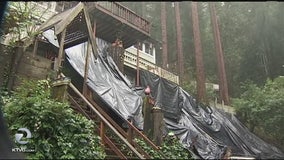 Home near Russian River in danger of sliding down hill because of El Niño