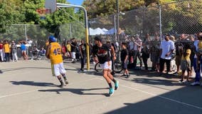 Steph Curry plays basketball with 'random dude' in Oakland during Mistah F.A.B. backpack giveaway
