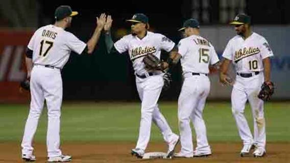 Gray throws complete game in A's 3-1 win