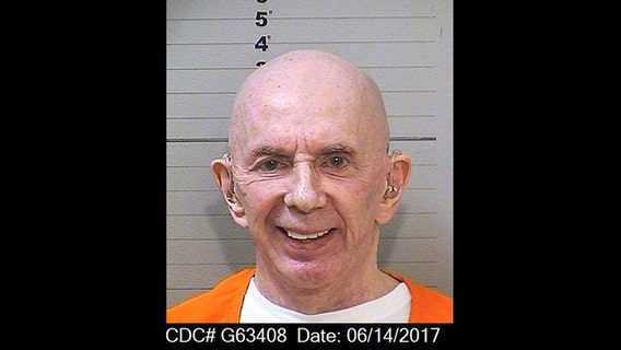 New mugshot from prison shows a completely bald Phil Spector