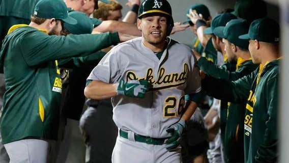 Valencia homers in 7-run 5th, A's rally past Mariners 11-5