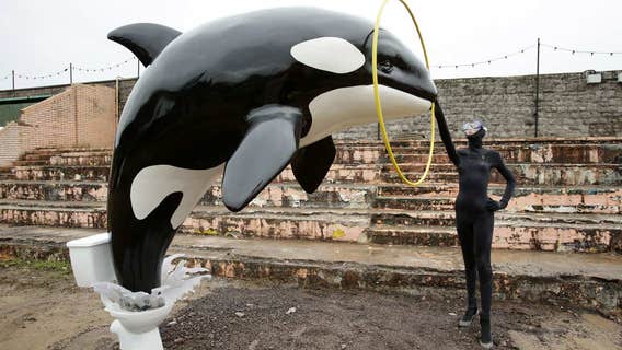 Artist Banksy opens derelict 'Dismaland' theme park at seaside resort