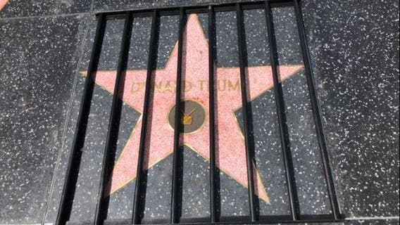 Prison bars taped to President Trump's star