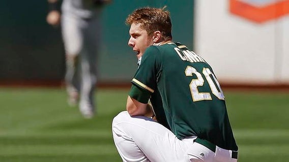 Davis' grand slam in 10th leads Orioles to 7-3 win over A's