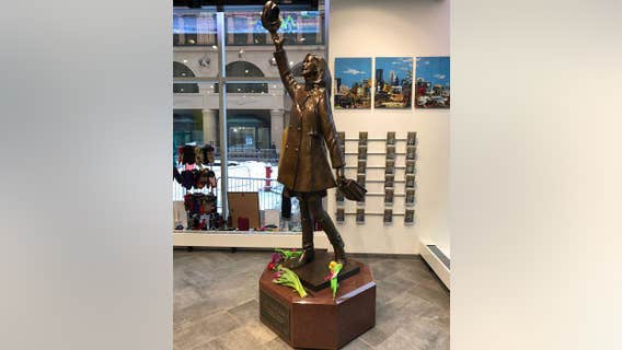 Flowers laid at Mary Tyler Moore statue in Minneapolis