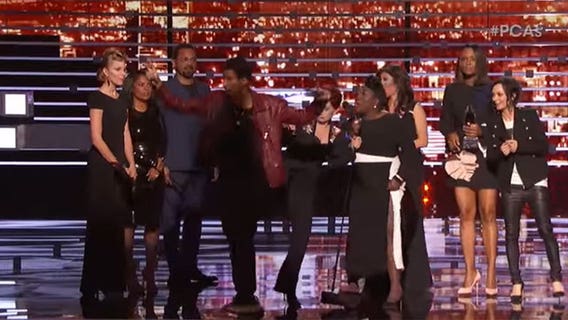 Sharon Osbourne kicks crasher off stage during People's Choice Awards