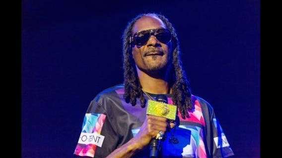 Railing collapses at N.J. Snoop Dogg concert, at least 10 hurt