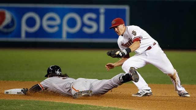 Pennington's error gives Giants 6-5 win over DBacks in 12