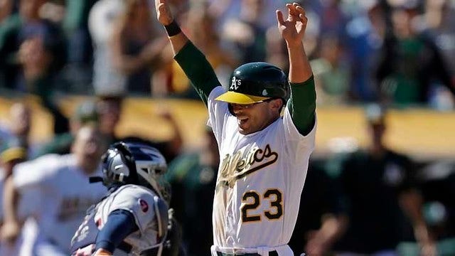 Athletics edge Indians in 10 innings, 2-1