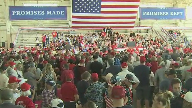 President Trump speaks to supporters at Mesa rally
