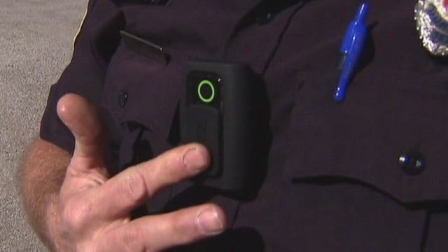 AP Exclusive: Moonlighting police leave body cameras behind
