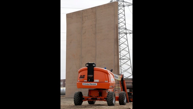 Prototypes of Trump's border wall take shape in San Diego