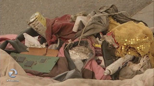 Oakland residents describe contents of illegal dumping, including dead dogs