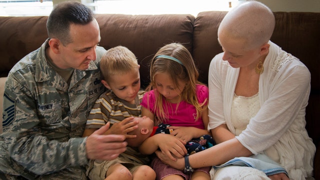 Photo of Florida mom battling cancer breastfeeding baby goes viral