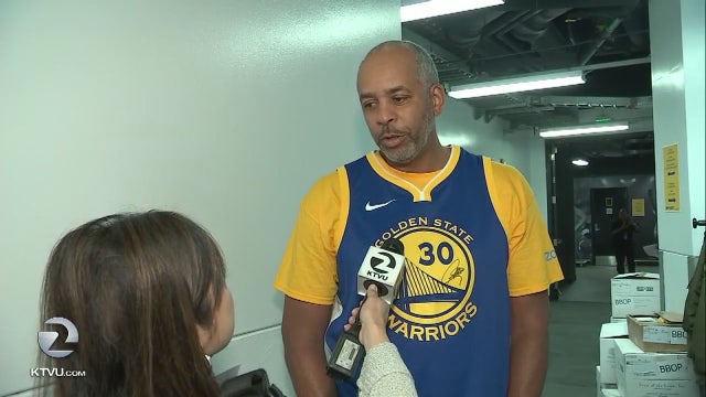 Brother v. Brother: Curry parents flip coin to decide which team T-shirt to wear