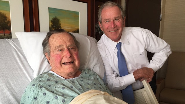 Former President George H.W. Bush still in hospital; son drops by for visit