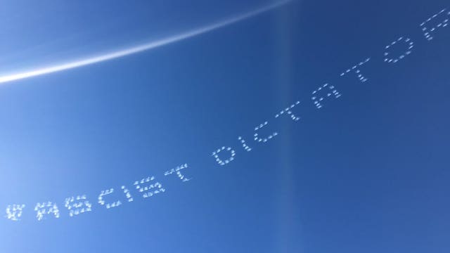 Political skywriting diverts attention at Rose Parade