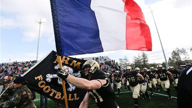 PHOTO GALLERY: Stadiums across the globe honor Paris victims