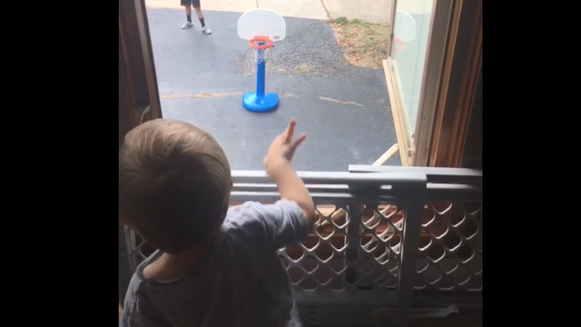 That Kid's Got Game: Trick shooting toddler makes multiple baskets from second-story window