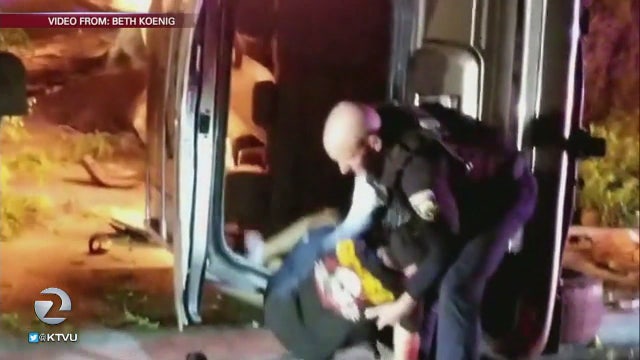 Caught on camera: Fremont police officer rescues man from burning car