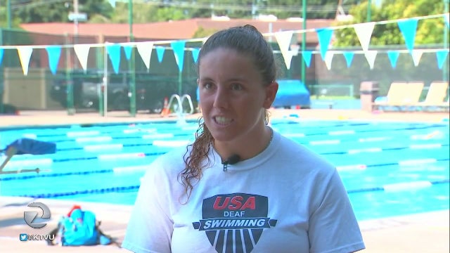 Deaf swimmer shatters expectations, records