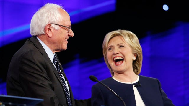 Clinton, Sanders clash on guns, economy, foreign policy
