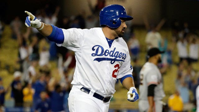 Dodgers beat Giants 5-4 in 14-inning marathon