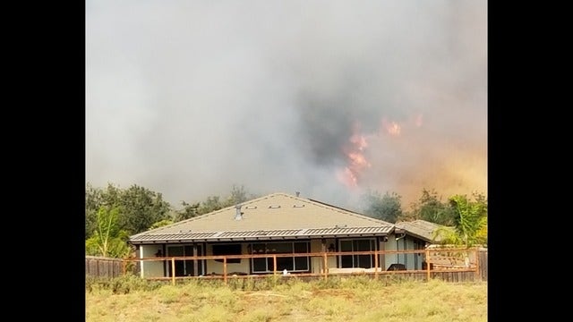 Fairfield grass fire 100 percent contained, one structure burned