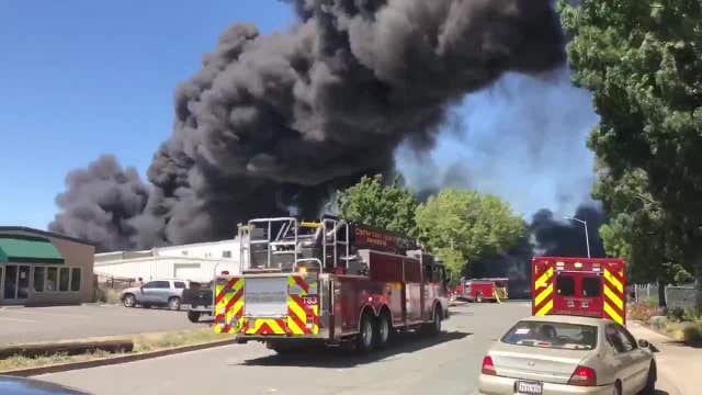 Pittsburg fire at lumber yard began at homeless encampment, one firefighter injured