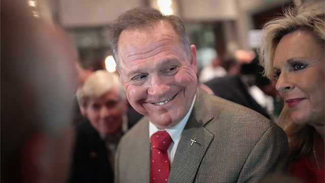 New sex assault allegation hits Moore; he calls it false