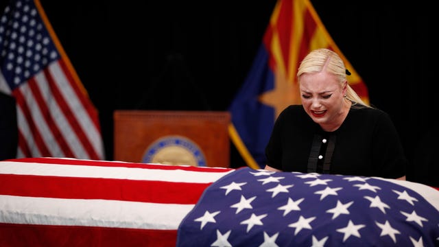Sen. John McCain's family cries over flag-draped casket